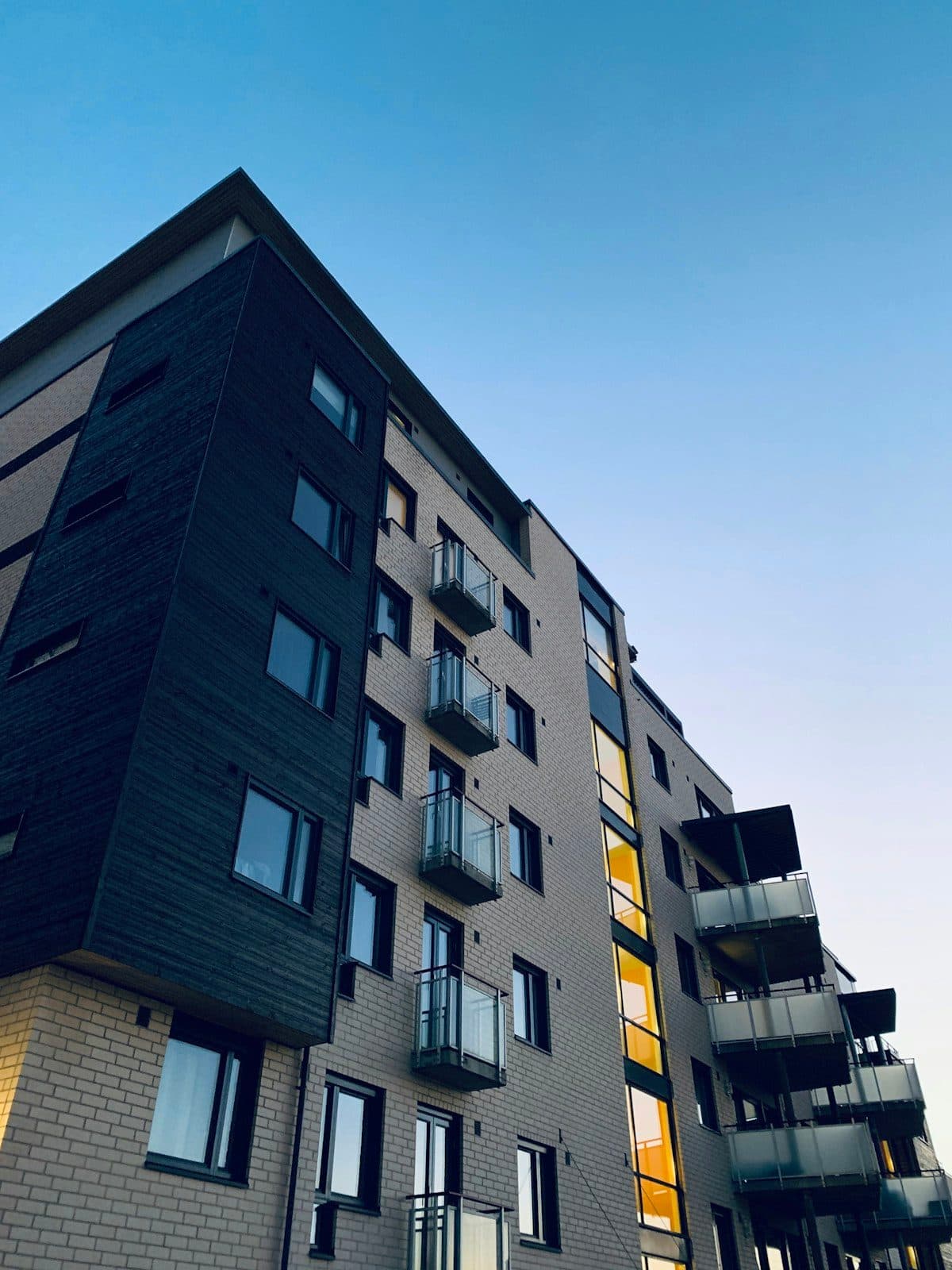 Modern residential apartment building looking up
